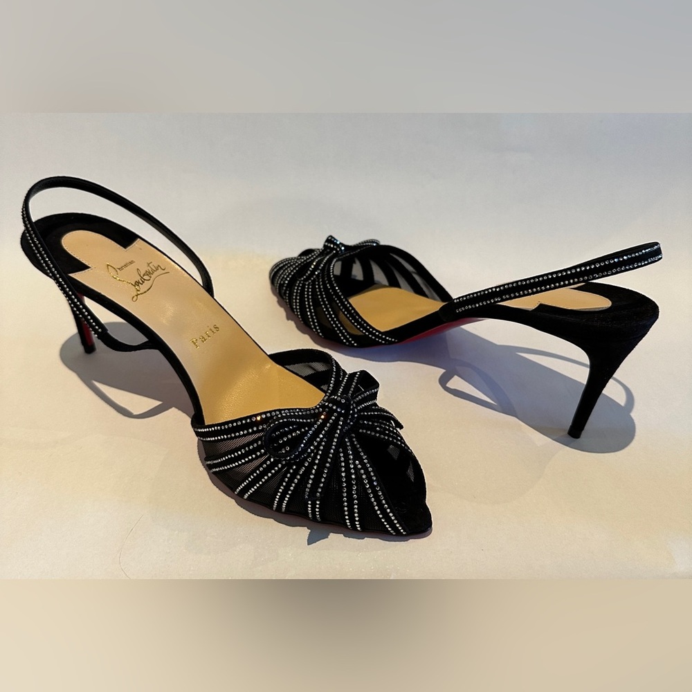 Christian Louboutin Araborda 70 crystal-embellished sling back sandals.